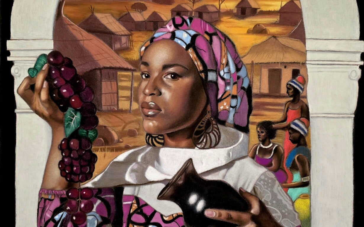 A woman in colorful clothing holds grapes and a black jug, standing before an arched window with a sunset village scene. Below her are a bowl of yams, a skull, and a carved mask. Other women and huts appear in the background.